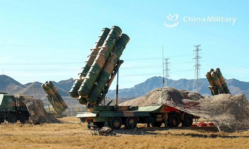 Troops assigned to a surface-to-air missile brigade of the air force under the PLA Central Theater Command set up the missile guidance system control station during a round-the-clock combat training exercise on November 2, 2022. (eng.chinamil.com.cn/Photo by Liu Yang)