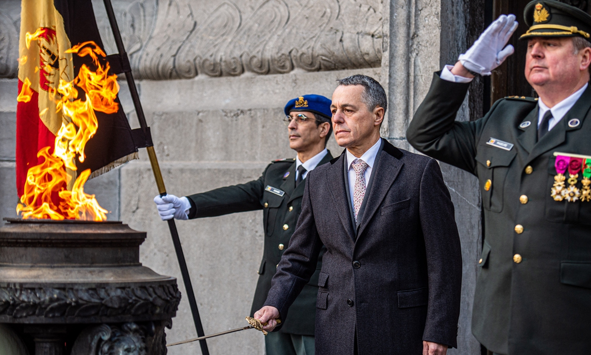 Swiss President Ignazio Cassis (center) attends a ceremony at the Unknown Soldier statue, part of an official state visit of the President of the Swiss Confederation, in Brussels, Belgium on November 24, 2022. The visit aims to reinforce the strong ties between Switzerland and Belgium. Photo: AFP