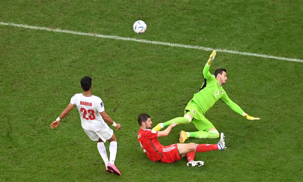 Ramin Rezaeian (No.23) of Iran scores his team's second goal during the match against Wales on November 25, 2022 in Doha, Qatar. Photo: VCG