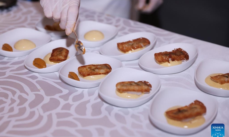 Snack dishes are presented at the unveiling ceremony of LA LISTE 2023 world restaurant ranking at the French Ministry of Foreign Affairs in Paris, France, Nov. 28, 2022. LA LISTE 2023, the latest update of a list of the best global restaurants, was unveiled here on Monday. Starting from 2015, LA LISTE has been handpicking the world's best restaurants based on the compilation of hundreds of guidebooks and publications plus millions of online reviews.(Photo: Xinhua)