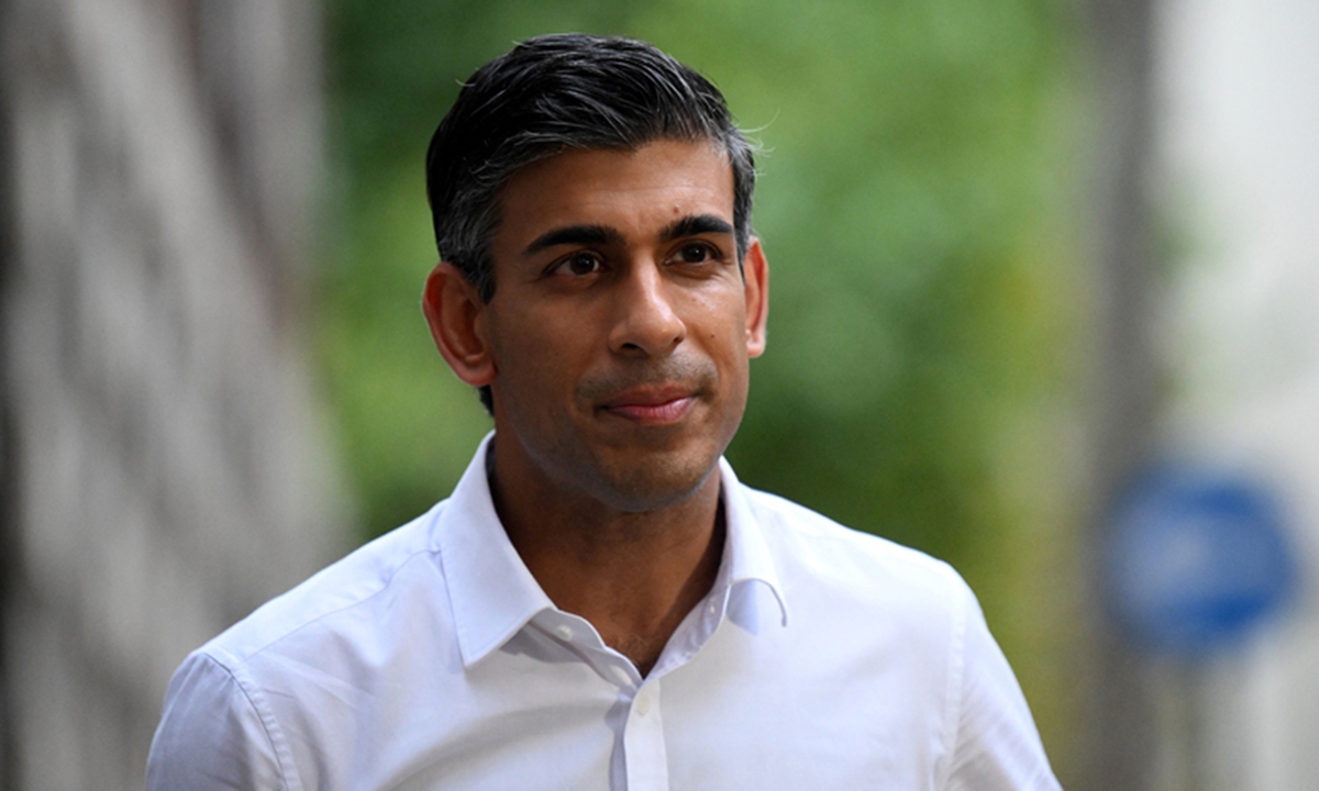 Rishi Sunak leaves from an office in central London on October 23, 2022. Photo: AFP