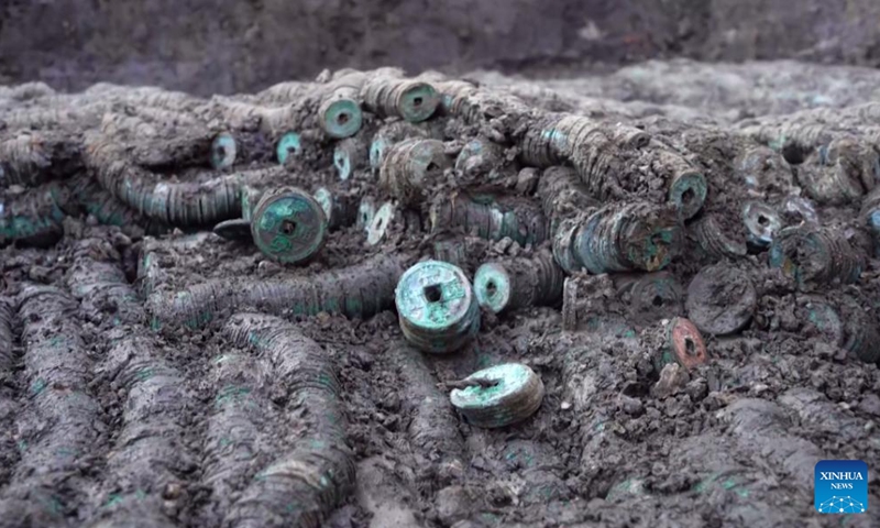 Ancient coins are unearthed in Jianhu County, Yancheng City, east China's Jiangsu Province, Oct. 23, 2022. An ancient coin hoard containing 1.5 tonnes of coins dating back to the Tang (618-907) and Song (960-1279) dynasties has been discovered in east China's Jiangsu Province.(Photo: Xinhua)
