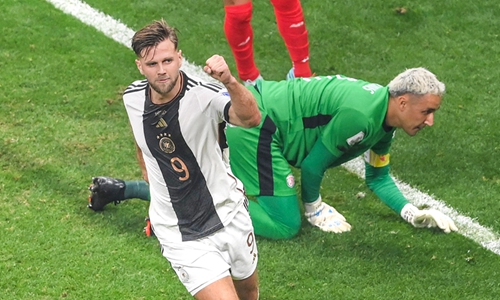 Germany’s Niclas Fuellkrug (No.9) celebrates scoring his team’s fourth goal against Costa Rica at the Qatar 2022 World Cup in Al Khor, north of Doha on December 1, 2022. Photo: VCG