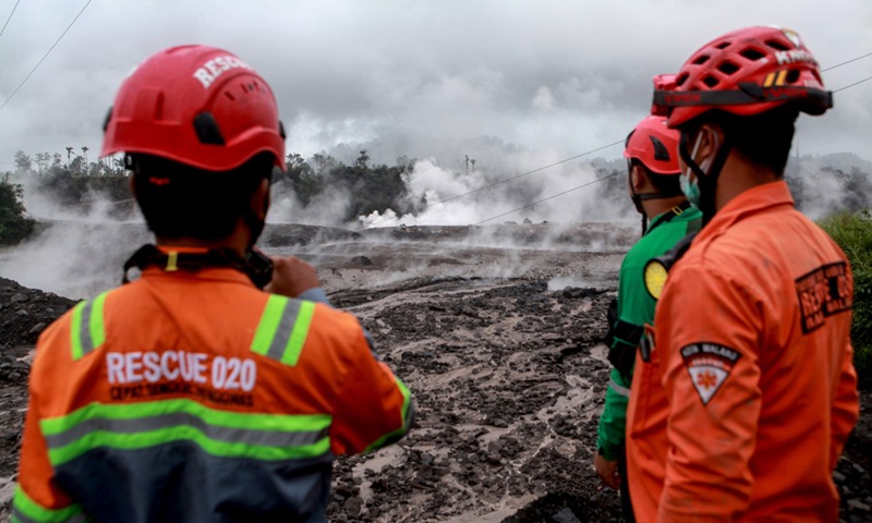 Rescuers inspect the affected area after the eruption of Mount Semeru at Sapiturang village in Lumajang, East Java, Indonesia on Dec. 4, 2022. (Photo by Bayu Novanta/Xinhua)