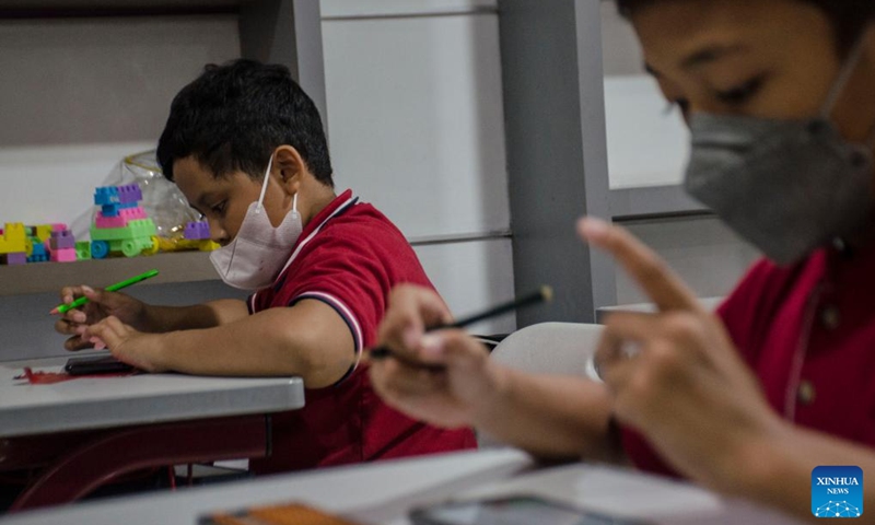 Students participate in an abacus showcase activity in Bandung, Indonesia, on Dec. 4, 2022. (Photo by Septianjar Muharam/Xinhua)