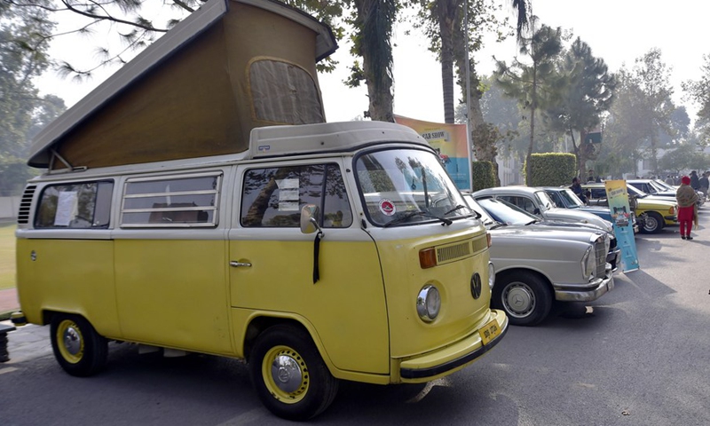 People visit the Vintage and Classic car show in northwest Pakistan's Peshawar on Dec. 4, 2022.(Photo: Xinhua)