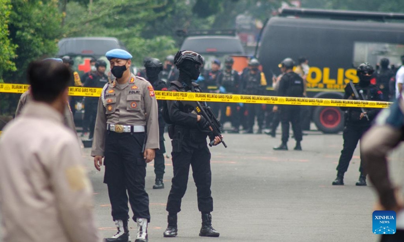 Police officers stand guard near the police station hit by suicide bombing in Bandung, Indonesia, Dec. 7, 2022. Two people were killed and nine others injured after a suicide bombing occurred at a police station in Bandung city, the capital of Indonesia's West Java province, on Wednesday morning, police said.(Photo: Xinhua)