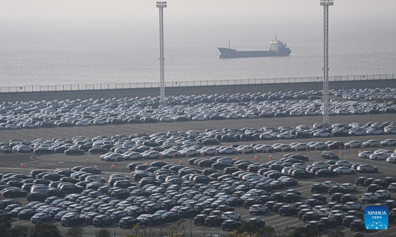 This photo taken on Dec. 13, 2022 shows vehicles at Meidong Dock of the Ningbo-Zhoushan Port in east China's Zhejiang Province. The cargo and container throughput of Ningbo-Zhoushan Port registered year-on-year growth of 3.41 percent and 7.84 percent respectively in the first 11 months in 2022. The port saw its cargo throughput reach 1.16 billion tons while the container throughput achieved 31.26 million twenty-foot equivalent units (TEUs).(Photo: Xinhua)