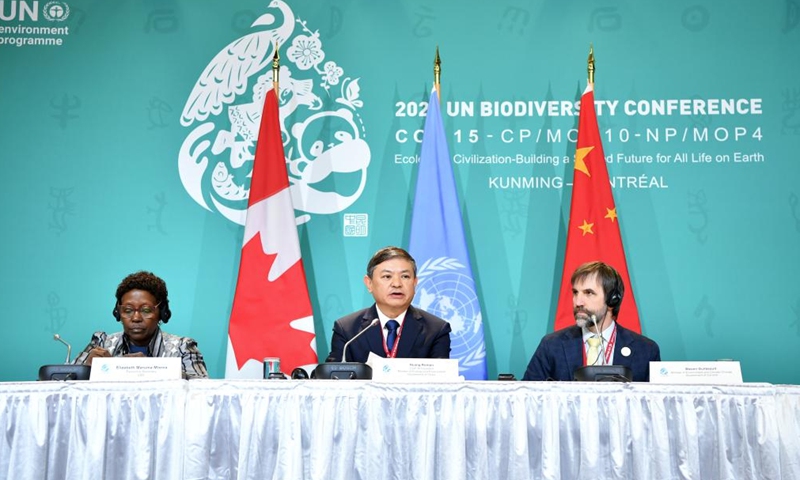 Huang Runqiu (C), COP15 president and China's minister of ecology and environment, speaks during a press conference in Montreal, Canada, on Dec. 17, 2022. (Xinhua/Ren Pengfei)