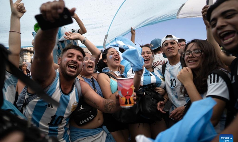 Fans of Argentina celebrate after their team winning the Final of the 2022 FIFA World Cup in Buenos Aires, capital of Argentina, Dec. 18, 2022. (Photo by Martin Zabala/Xinhua)