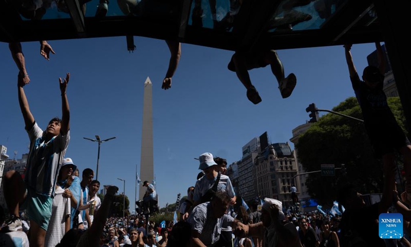 Fans of Argentina celebrate after their team winning the Final of the 2022 FIFA World Cup in Buenos Aires, capital of Argentina, Dec. 18, 2022. (Photo by Martin Zabala/Xinhua)