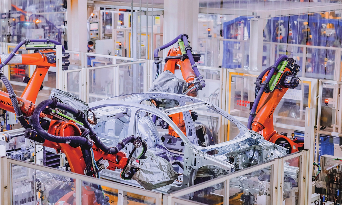 An auto factory in Qingdao, East China's Shandong Province rushes to make cars to meet market demand on December 20, 2022. From January to November this year, China's vehicle production reached 21.2 million units, up 14.9 percent year-on-year, data from the China Passenger Car Association showed. Photo: cnsphoto
