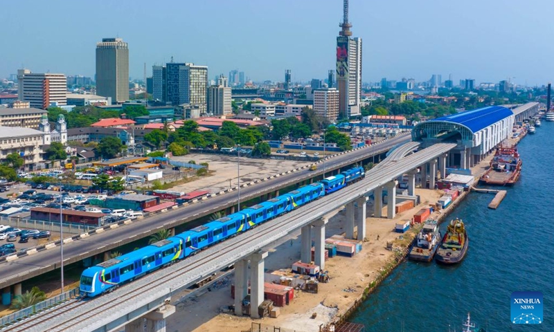 This photo taken on Dec. 21, 2022 show a train of a light rail project running during a completion ceremony in Lagos, Nigeria. Nigeria's southwestern state of Lagos on Wednesday marked the completion of the first phase of a 27-km electric-powered light rail project.(Photo: Xinhua)