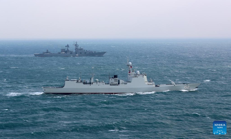 Destroyer Jinan of Chinese navy (front) and cruiser Varyag of Russian navy are seen during a joint naval exercise, Joint Sea 2022, in the East China Sea on Dec. 21, 2022. Chinese and Russian navies on Wednesday kicked off a joint naval exercise, Joint Sea 2022, in the East China Sea.(Photo: Xinhua)