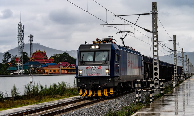 A freight train is to enter the China-Laos Railway's Friendship Tunnel connecting Mohan in southwest China's Yunnan Province and Boten in northern Laos, Nov. 24, 2022. (Xinhua/Hu Chao)