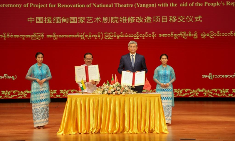 Chinese Ambassador to Myanmar Chen Hai (2nd R) and Myanmar's Union Minister for Religious Affairs and Culture U Ko Ko (2nd L) attend the handover ceremony of China-aided renovation project for the National Theatre of Yangon in Myanmar's largest city of Yangon, Dec. 27, 2022. The China-aided renovation project of the National Theatre of Yangon was officially handed over to the Myanmar government here on Tuesday.(Photo: Xinhua)