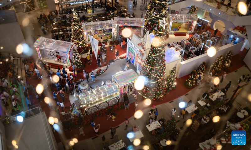 People visit a shopping mall in Kuala Lumpur, Malaysia, Dec. 26, 2022.(Photo: Xinhua)