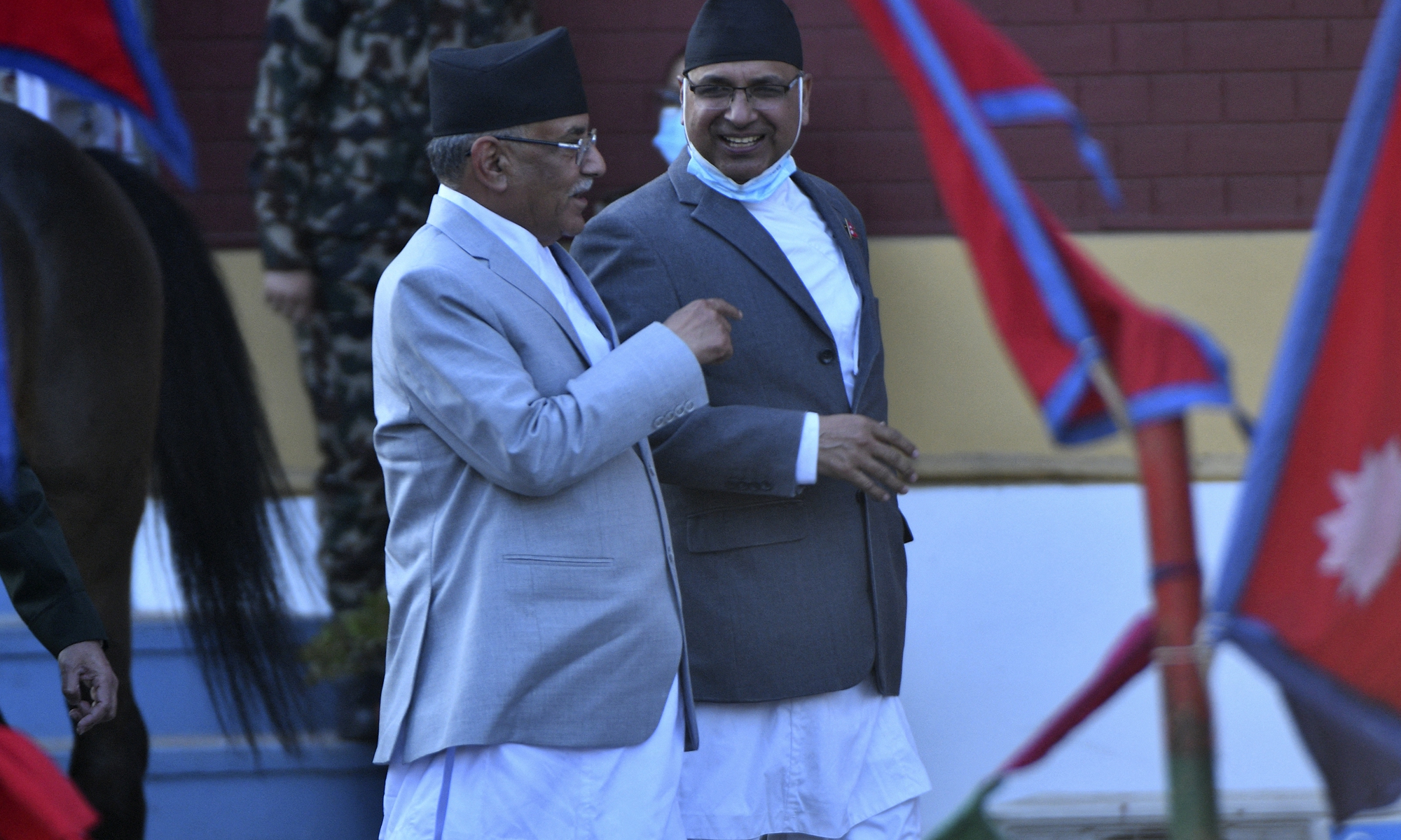 Nepal's newly elected Prime Minister Pushpa Kamal Dahal (left) arrives to attend his swearing-in ceremony at the President's House in Kathmandu on December 26, 2022 (See story on Page 3). Photo: AFP