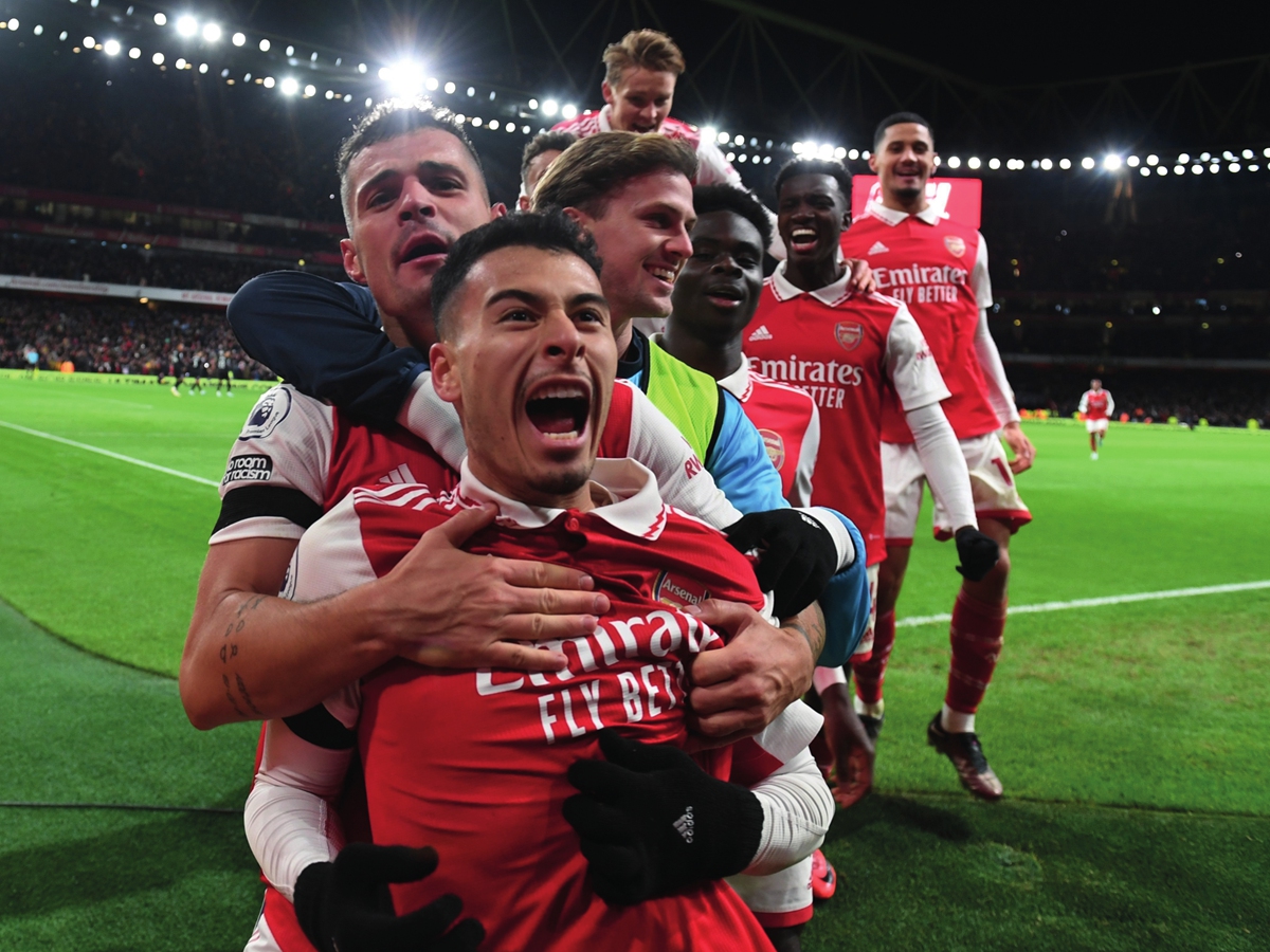 Arsenal players celebrate a goal during the Premier League match against West Ham United on December 26, 2022 in London, England. Photo: VCG
