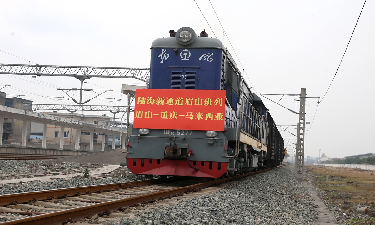 A cargo train departs for Malaysia from Meishan, Southwest China's Sichuan Province on December 29, 2022, marking the official opening of the sea-rail intermodal freight train of the 