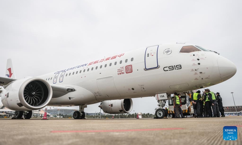 A C919 large passenger aircraft, China's first homegrown large jetliner, is pictured at Meilan International Airport in Haikou, south China's Hainan Province, Jan. 2, 2023. The aircraft, which belongs to China Eastern Airlines, landed at Meilan International Airport in Haikou on Monday as a part of the 100-hour aircraft validation flight process. The testing process will comprehensively verify the reliability of the C919 with commercial operation in mind -- with the aim of ensuring its safety and efficiency. (Xinhua/Zhang Liyun)