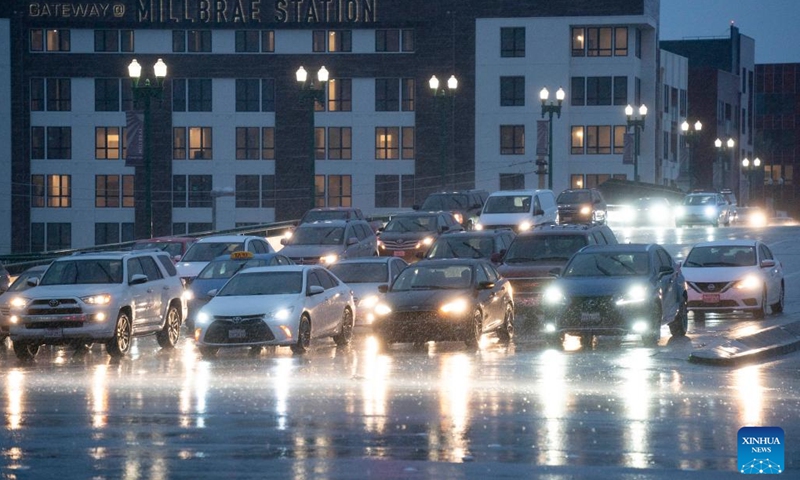 Vehicles drive in storm in Millbrae, California, the United States, Jan. 4, 2023. A winter storm hit northern California, bringing rain and snow to the local area.(Photo: Xinhua)