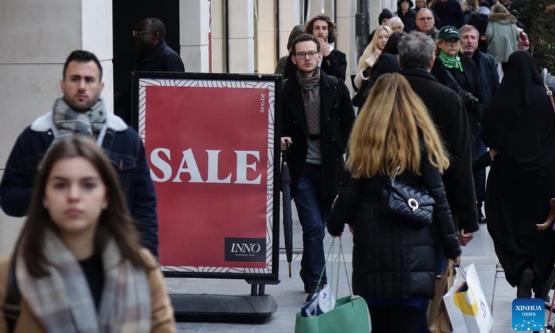 An advertisement of winter sales is seen on a street in Brussels, Belgium, on Jan. 3, 2023. Belgium's 2023 winter sales take place from Jan. 3 to Jan. 31.(Photo: Xinhua)