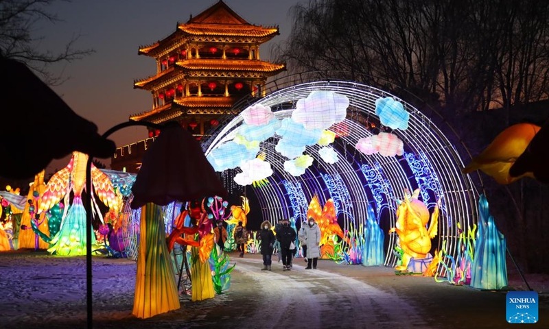 People visit a lantern fair in Shenyang, northeast China's Liaoning Province, Dec. 31, 2022. Liaoning Province has rolled out a variety of ice-snow tourism activities to boost its winter tourism industry.During the three-day New Year holiday, Liaoning received about 6.27 million tourists, with tourism income reaching some 4.804 billion yuan (about 698 million U.S. dollars).(Photo: Xinhua)