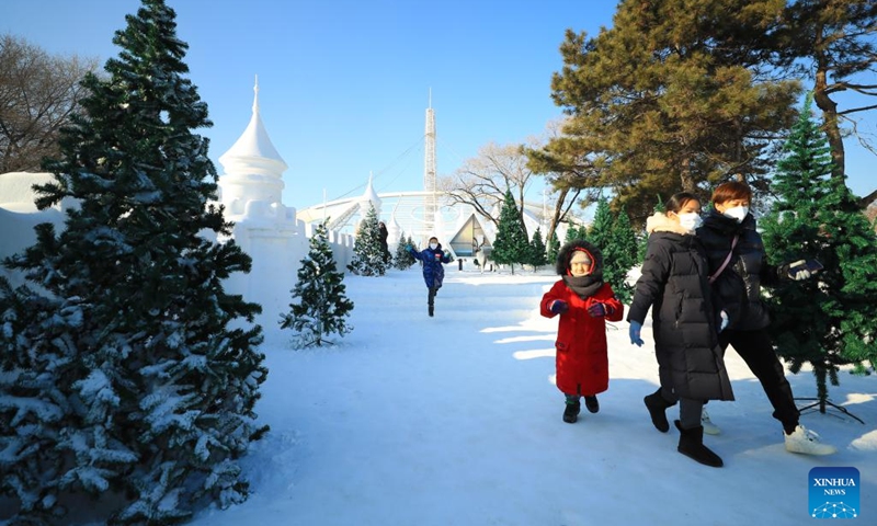 People have fun in Shenyang Expo Garden in Shenyang, northeast China's Liaoning Province, Jan. 3, 2023. Liaoning Province has rolled out a variety of ice-snow tourism activities to boost its winter tourism industry.During the three-day New Year holiday, Liaoning received about 6.27 million tourists, with tourism income reaching some 4.804 billion yuan (about 698 million U.S. dollars).(Photo: Xinhua)