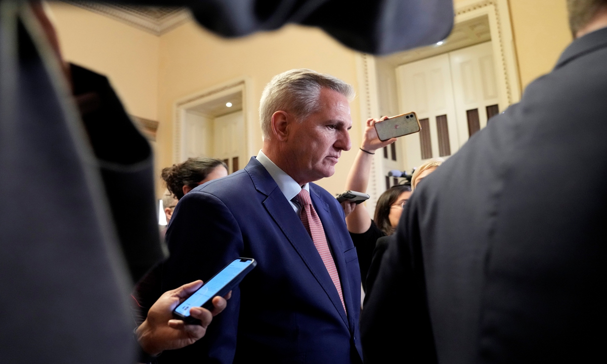 US House Republican Leader Kevin McCarthy is followed by reporters as he heads to the Capitol Hill in Washington on January 3, 2023. McCarthy failed to win the 218 votes required to become Speaker. Photo: VCG