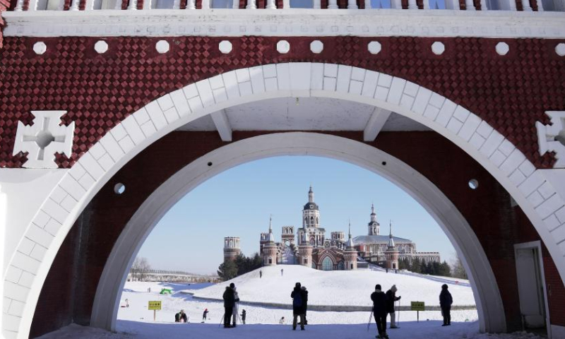 People visit the Volga Manor in Harbin, northeast China's Heilongjiang Province, Jan. 26, 2023. The Volga Manor, a Russian culture-themed park, turned into an ice and snow world during the Spring Festival, attracting lots of visitors. Photo: Xinhua