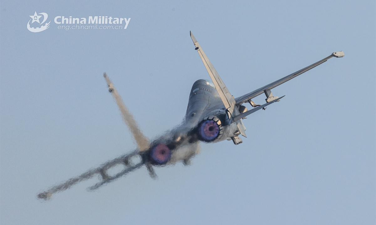 A fighter jet attached to an aviation brigade of the air force under the PLA Northern Theater Command soars to a designated airspace during a combat flight training exercise on January 3, 2023. Photo: China Military