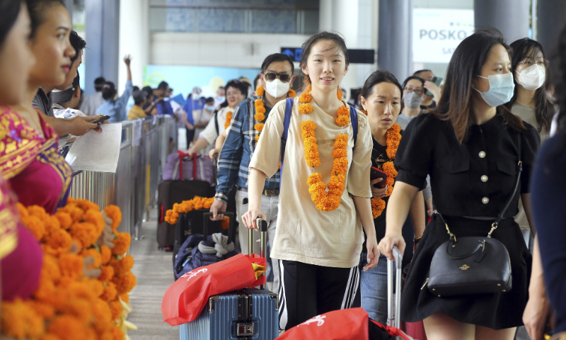 Chinese tourists arrive at Ngurah Rai International Airport in Bali, Indonesia on January 22, 2023. Photo: VCG