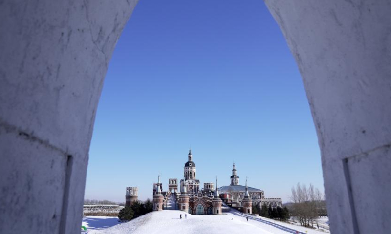 People visit the Volga Manor in Harbin, northeast China's Heilongjiang Province, Jan. 26, 2023. The Volga Manor, a Russian culture-themed park, turned into an ice and snow world during the Spring Festival, attracting lots of visitors. Photo: Xinhua
