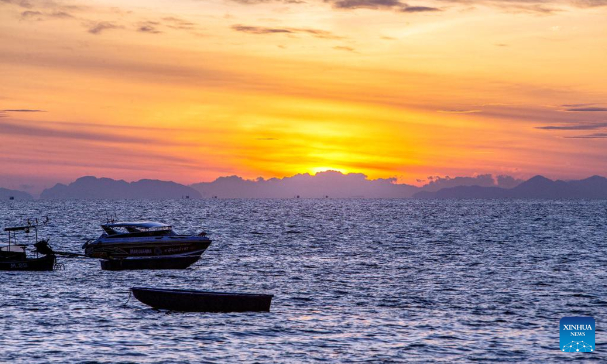 This photo taken on Feb 16, 2023 shows the sunrise at Phi Phi Islands national park in Krabi, Thailand. Phi Phi Islands national park, with an area of about 388 square kilometers, attracts numerous tourists every year. Photo:Xinhua