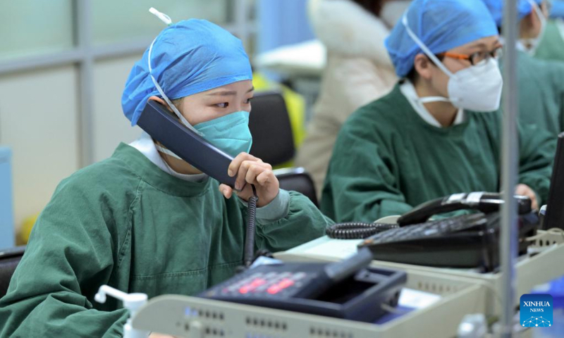 Medical staff work at the emergency department of the Second Affiliated Hospital of Anhui Medical University in Hefei, east China's Anhui Province, Jan. 21, 2023. Medical staff stick to their posts during the Spring Festival holiday. (Xinhua/Zhou Mu)