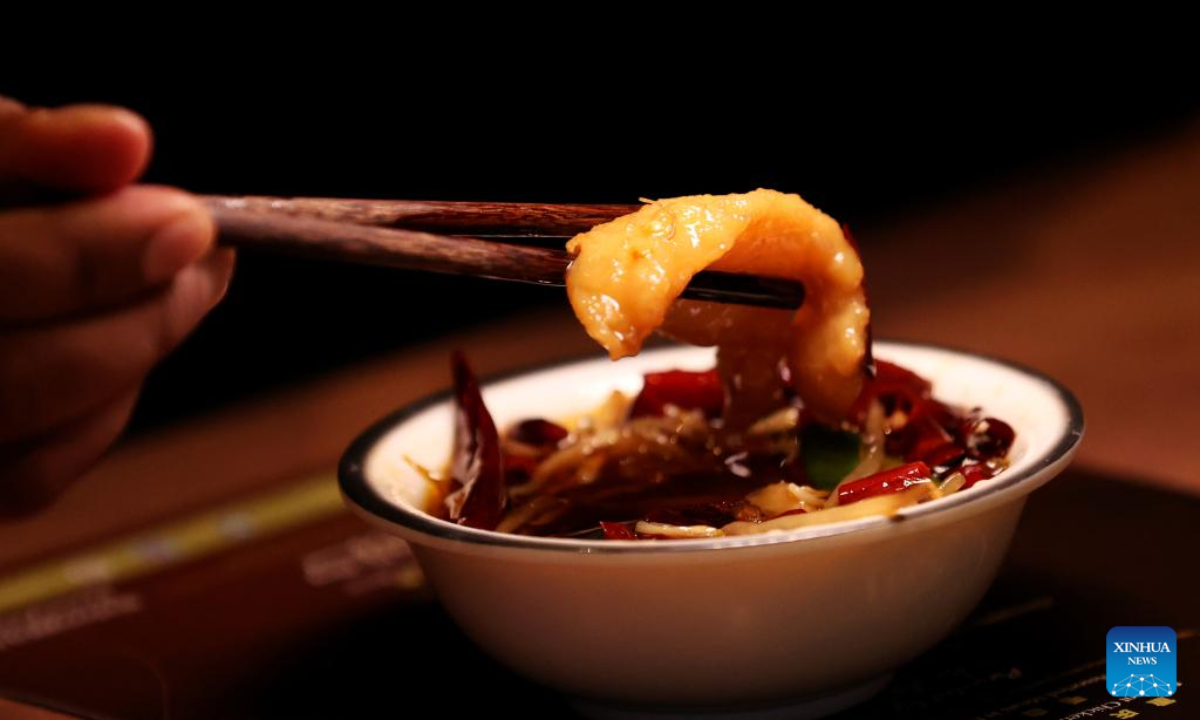 Boiled spicy fish fillet is seen during