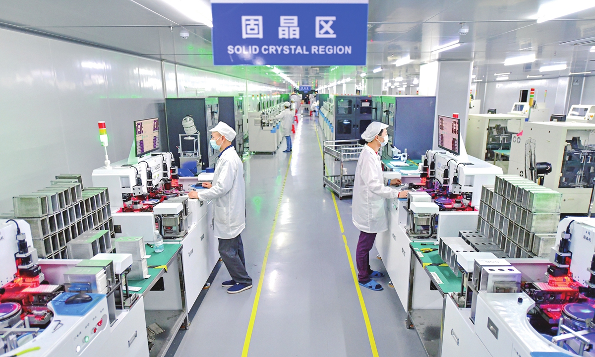 Workers check semiconductor products at a manufacturing factory in Ganzhou, East China's Jiangxi Province on November 24,2022. Photo: VCG