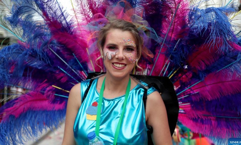 A reveller takes part in a carnival parade in Loures on the outskirts of Lisbon, Portugal, Feb. 19, 2023. Photo: Xinhua