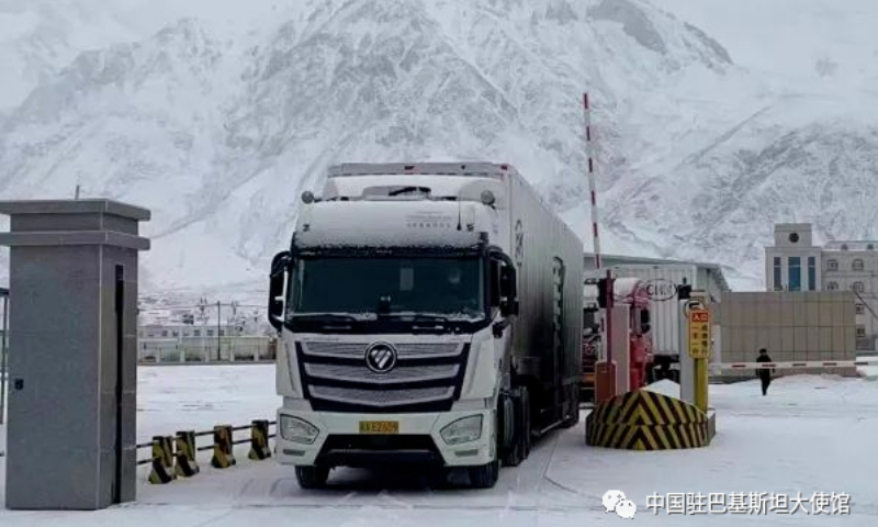 Trucks carrying emergency supplies travel through the Khunjerab Pass in Northwest China's Xinjiang region.