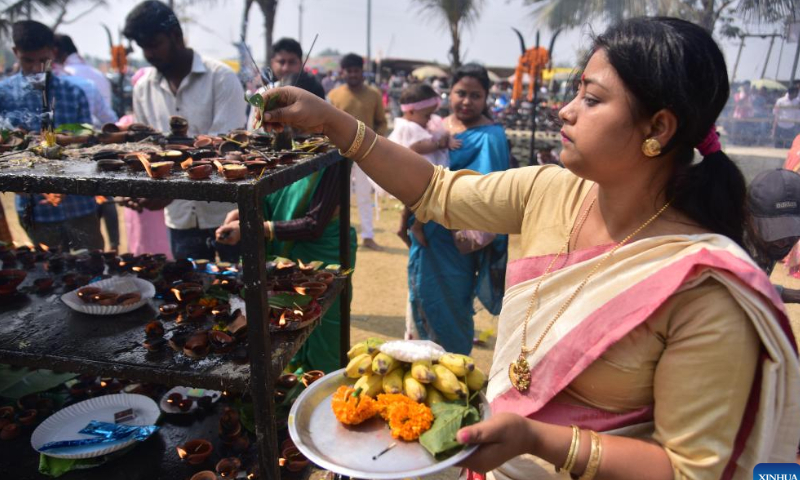 Devotees visit a temple to pray during the Hindu festival Maha Shivaratri at a temple in Nagaon district of India's northeastern state of Assam, Feb. 18, 2023. Photo: Xinhua
