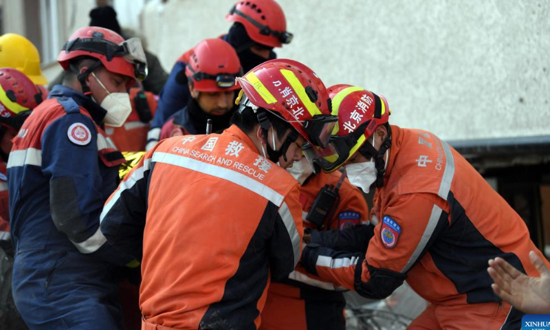 Members of the China Search and Rescue Team transfer an earthquake survivor in Antakya in the southern province of Hatay, Türkiye, Feb. 12, 2023. Photo: Xinhua