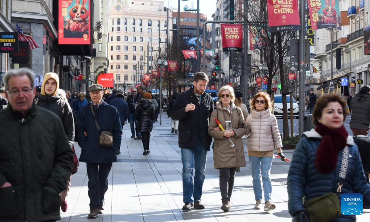 Chinese New Year posters are seen on a street in Madrid, Spain, Jan 21, 2023. Photo:Xinhua