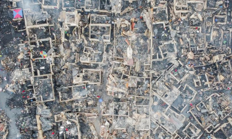 This aerial photo taken on Feb. 19, 2023 shows the charred houses after a fire at a residential area in Quezon City, the Philippines. Photo: Xinhua