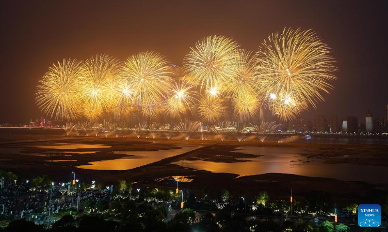 Fireworks light up the sky over the city of Nanchang, east China's Jiangxi Province, Jan. 22, 2023. Sending traditional blessings to locals, a grand fireworks show was held on Sunday here to celebrate the Spring Festival. (Xinhua/Zhou Mi)