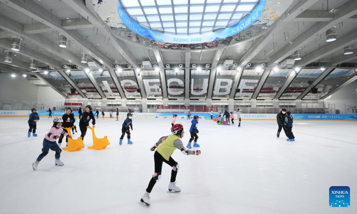 People enjoy skating at National Aquatics Centre in Beijing, capital of China, Feb 1, 2023. Photo:Xinhua