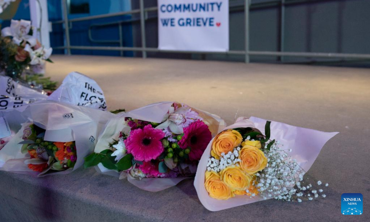 Flowers are placed to mourn victims of the shootings in Half Moon Bay in California, the United States, Jan 24, 2023. Seven people were killed and one was critically injured in two shootings in northern California on Monday, US media reported. Photo:Xinhua