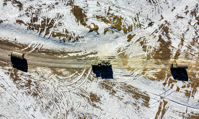 Military vehicles attached to a regiment under the PLA Xinjiang Military Command maneuver quickly en route to the designated area at the elevation of 5300 meters in the real-combat training in middle January, 2023. Photo: eng.chinamil.com.cn