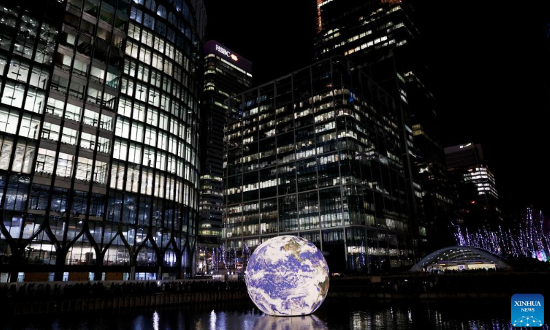 This photo taken on Jan. 27, 2023 shows a light installation titled Floating Earth during a winter light show at Canary Wharf in London, Britain. Photo: Xinhua