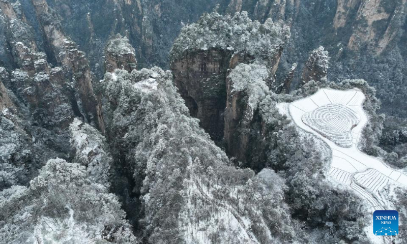 This aerial photo taken on Jan. 16, 2023 shows a view of the snow-covered Tianzi Mountain in Zhangjiajie City in central China's Hunan Province. (Xinhua/Zhao Zhongzhi)